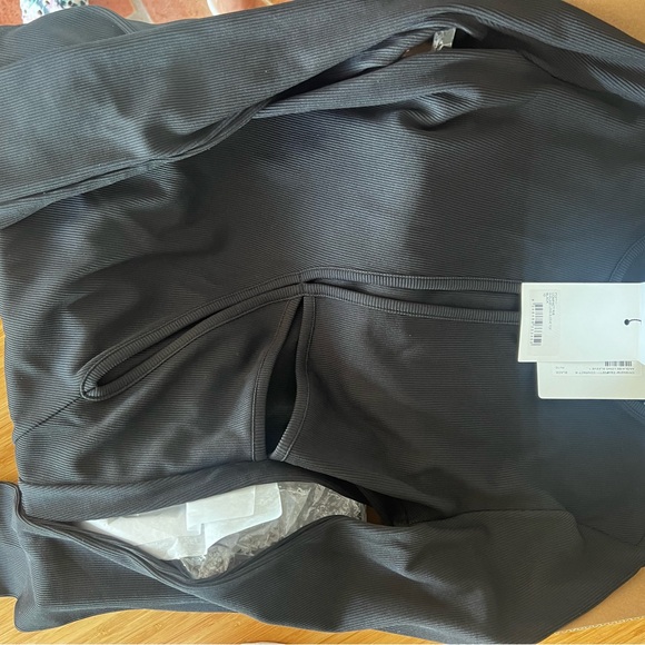 Christopher Esber long sleeve top black
Knit shirt with cutouts
Anglaise
NWT - Picture 7 of 10